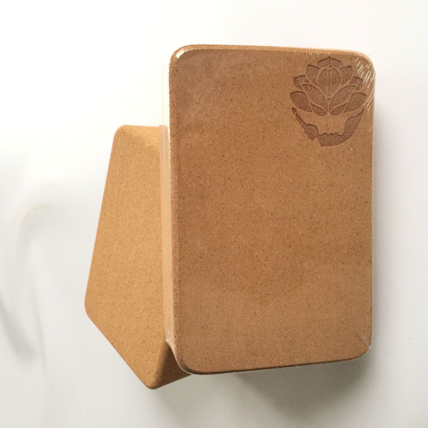 High-density natural cork yoga block for balance and support  with lotus flower in the corner– YOGIVERSE